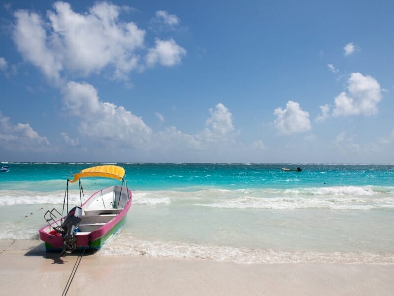 Tulum beach with motorboat