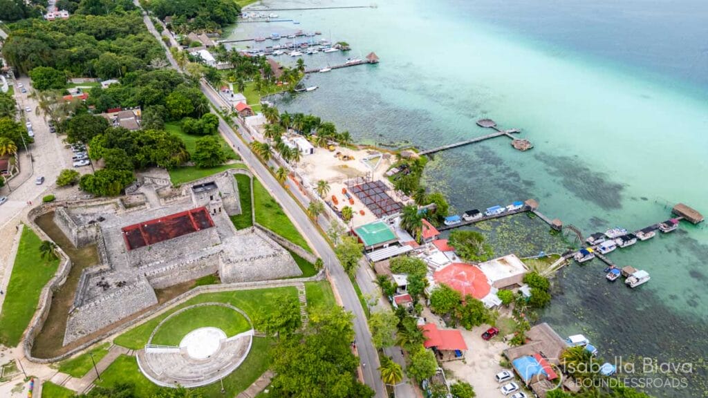 Aerial view of coastal fort and marina.